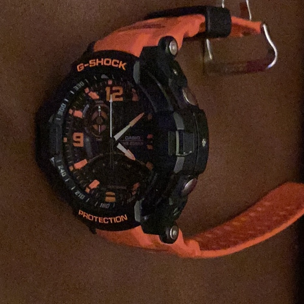 G-shock black and orange watch
